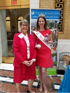 Marketing Director of the Plymouth County Convention & Visitors Bureau, Paula Fisher, stands alongside Miss Bay State Monique Vacon during Tourism Day.