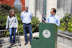 Ben Hellerman of Environment Massachusetts announces Pittsfield as one of Massachusetts' 'clean energy leaders' in front of City Hall in Pittsfield