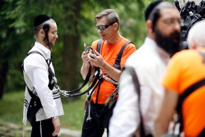Hasidic Jews being instructed on how to enjoy the ropes course at Jiminy Peak Resort in Hancock, MA