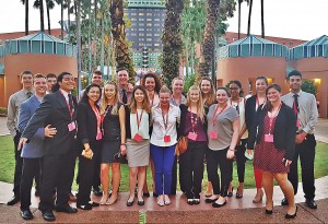Large group of Taconic High students dressed for success pose in outdoors at an Orlando conference.