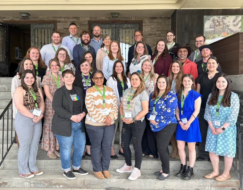 BLP class 2025 The group class of berkshire leadership program stand together on a set of stairs.